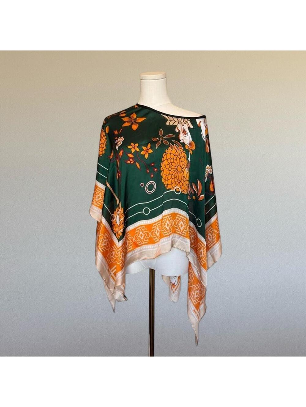Bunny and floral print poncho. One size.